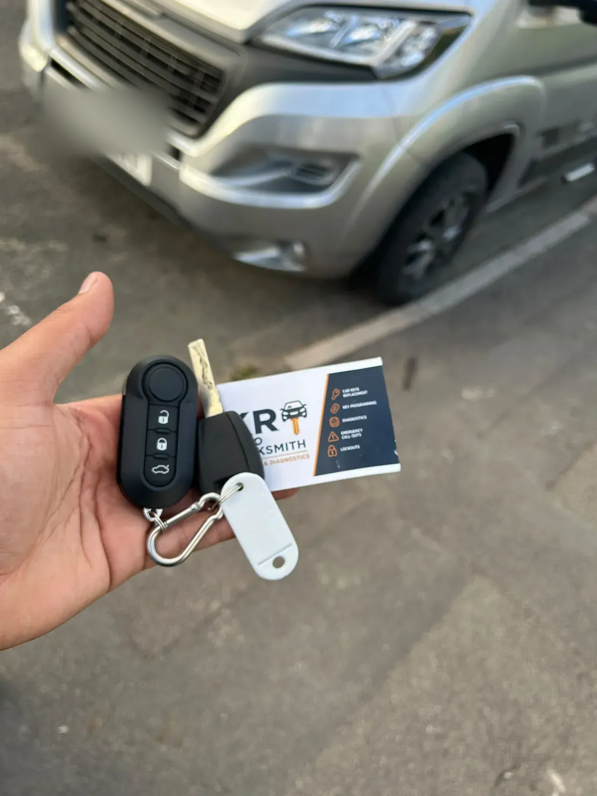 A new key and fob cut and paired for a Peugeot panel van